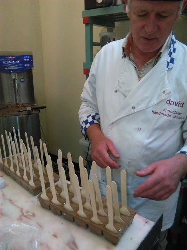Attaching the Wooden Spoons to the Hot Chocolate Dips before the chocolate sets!